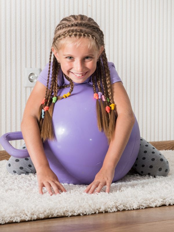 smiling girl on the ball